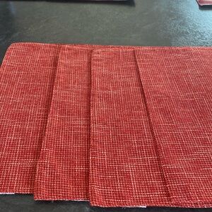 Set of 4 placemats. Orange/red.